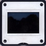 Slide Frame: The chief's son's hut at sunrise: A...