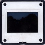Slide Frame: The chief's son's hut at sunrise: A...