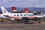 Front: Air Madagascar Piper PA-31 Navajo, ...