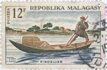 Front: Mail Pirogue: 12-Franc Postage Stam...