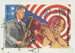 Front: Music: Bill Clinton and Louis Armst...