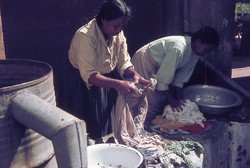 Madame Rakotandrazaka, wife of the District Pastor, doing laundry: Friends School, Soavinandriana