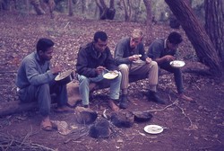 Scout camp leaders eating rice: Ambositra