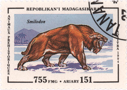 Prehistoric Animals: Smilodon: 755-Franc (151-Ariary) Postage Stamp